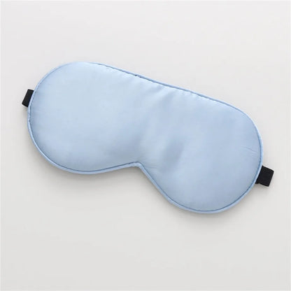 light blue silk sleeping mask on a white background